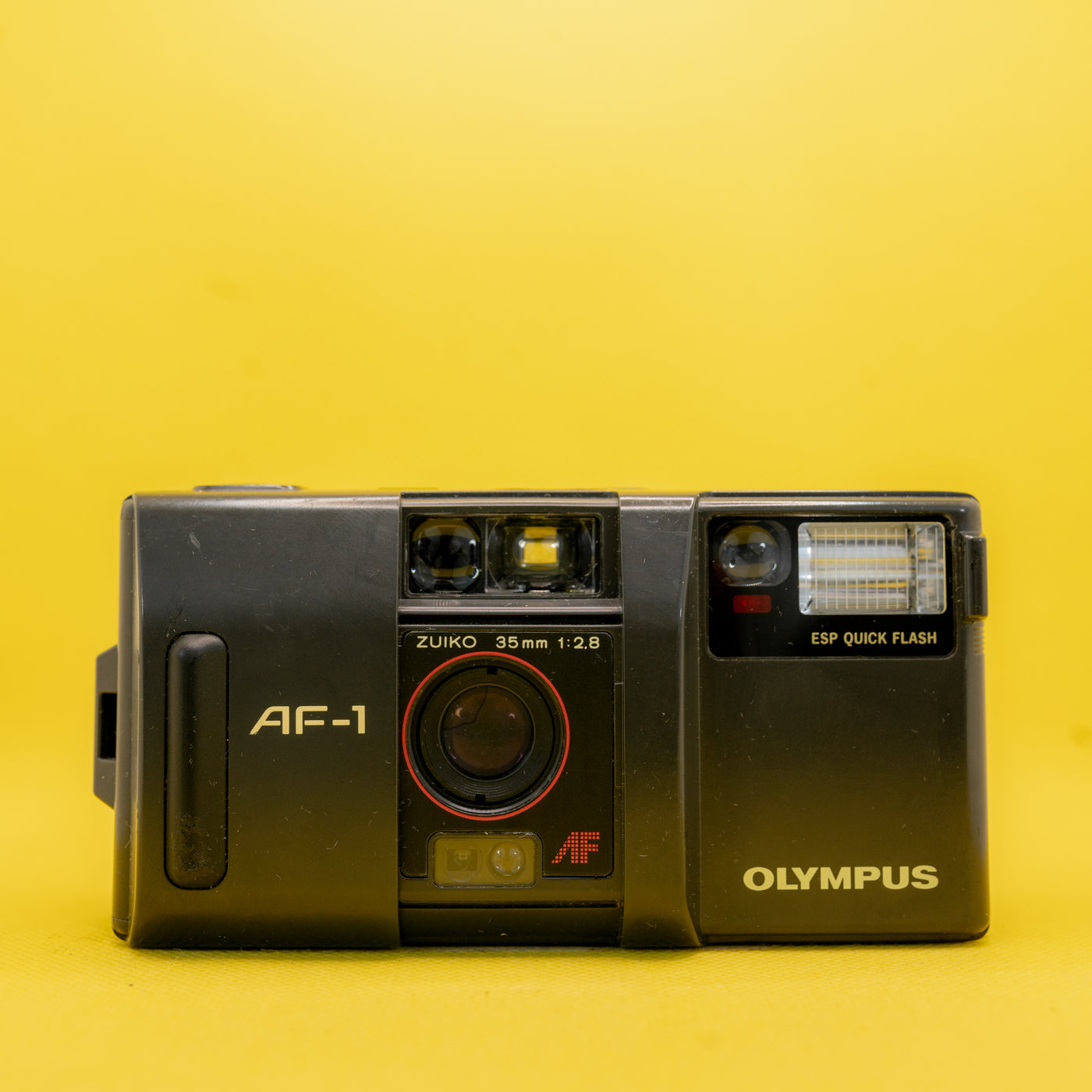 Olympus AF-1 - Profesjonalny aparat 35mm (Zuiko 2.8) · zdjęcie główne
